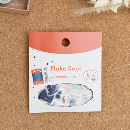 Papier Platz x Eric Small Things Washi Flake Stickers - Sewing Package on cork