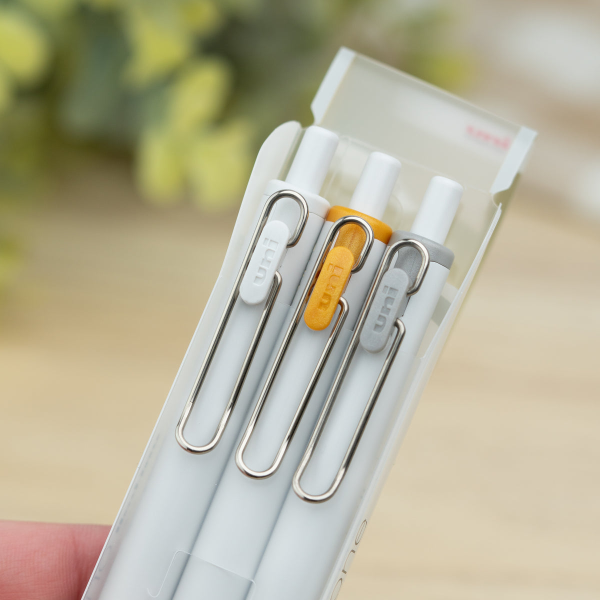 Uni-ball One Metallic Gel Pens White Orange and Grey