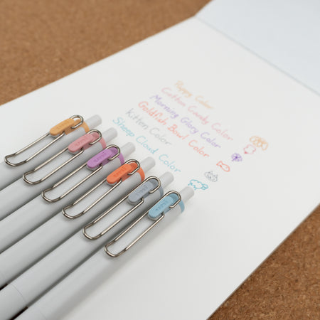 Uniball One 2024 Summer Yuru Matope Limited Edition Gel Pens Writing Example Cork Background